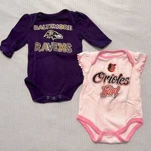 Two Baltimore sports baby girl onesies! Long sleeve Ravens/Short sleeve Orioles